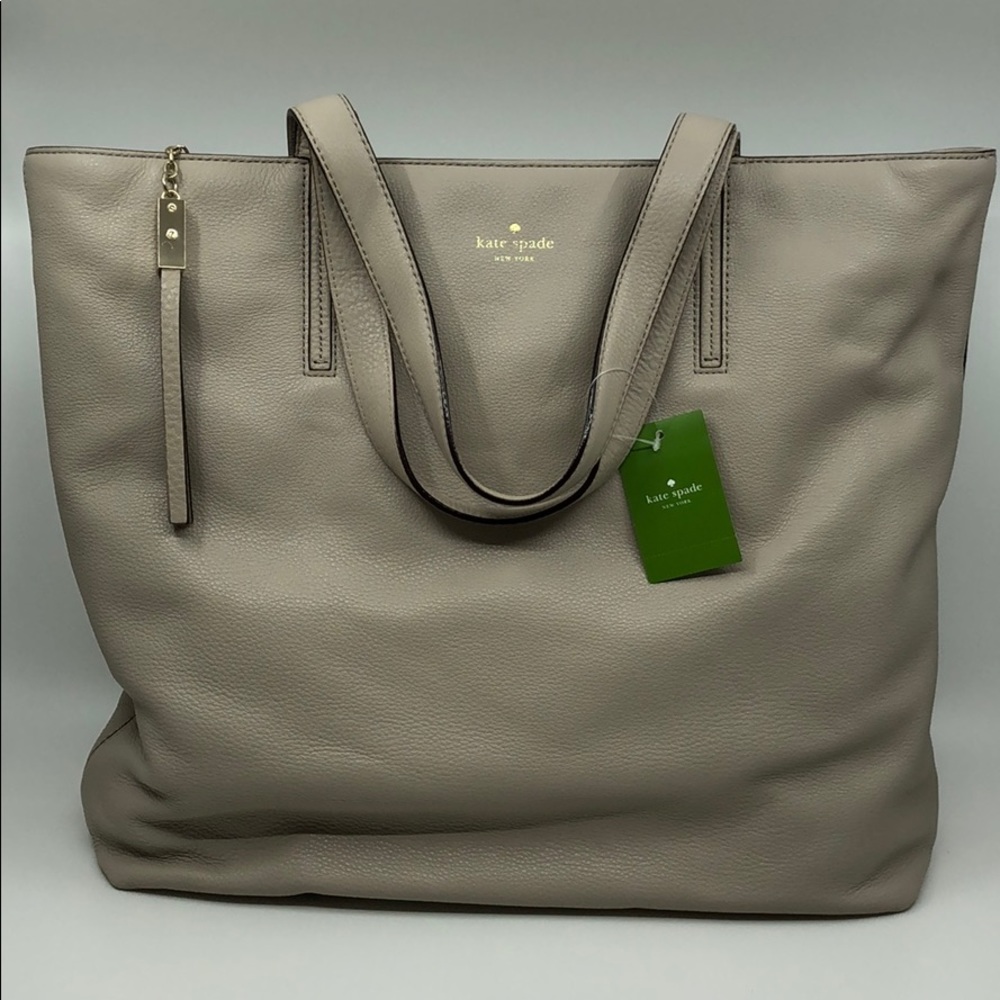 Kate Spade Leather bag
Size: 18"L x 4.5"W x 15"H